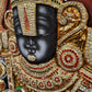 Tirupati Balaji Tanjore painting in a wooden frame with intricate gold details and vibrant colors.