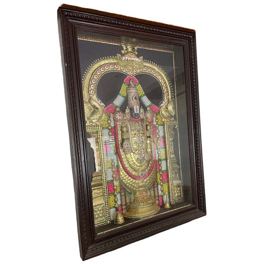 Tirupati Balaji Tanjore painting in a wooden frame with intricate gold details and vibrant colors.